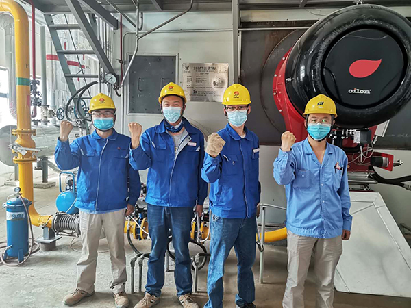 1590472304241725.jpeg 參與開工鍋爐點(diǎn)火的部分員工.jpg